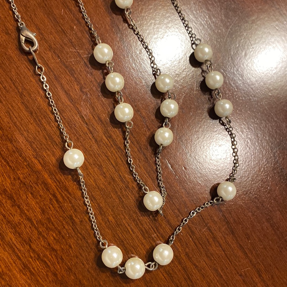 Long silver pearl necklace
